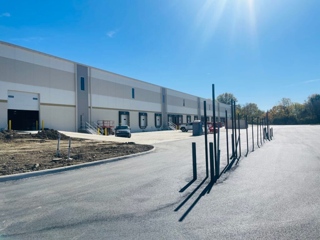 Warehouse and distribution building with loading docks and parked trailers